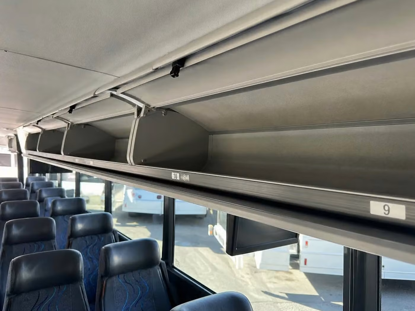 kingman charter bus overhead storage